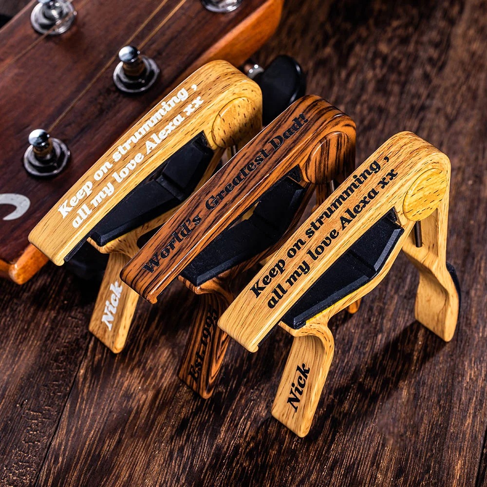 Gravierter Gitarrenkapodaster